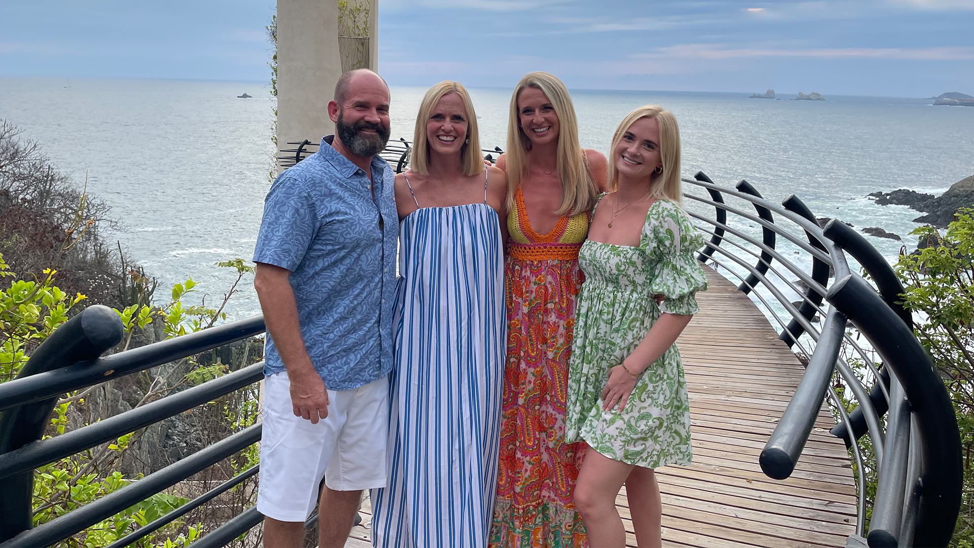 Photo of the Lyons Family in front of a pier